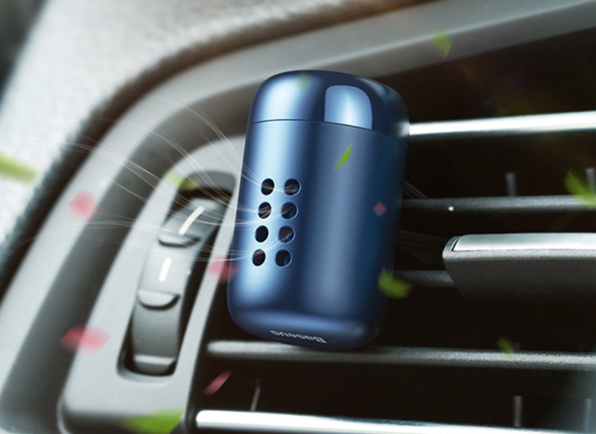 ScentFrame car air freshener clipped to car vent releasing fragrance
